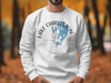 White sweatshirt with Lake Charleston Ontario map and compass graphic.