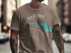 Brown t-shirt with "PACTOLA LAKE SOUTH DAKOTA" and compass graphic.