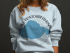 Light blue sweatshirt with Lake Pontchartrain map and compass design.