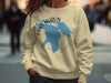 Cream sweatshirt with blue Lake Huron map and compass graphic.