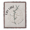 Lay Lake Alabama map on a woven throw blanket with compass rose design.