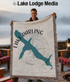 Woven blanket with teal map of Lake Darling, Iowa, and compass rose.