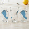 Three glasses with Pyramid Lake Nevada maps and compass graphics.