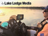 Man in boat at sunrise with "Lake Lodge Media" logo and "Crater Life" sticker.