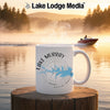 White mug with Lake Murray map and compass design, steaming.