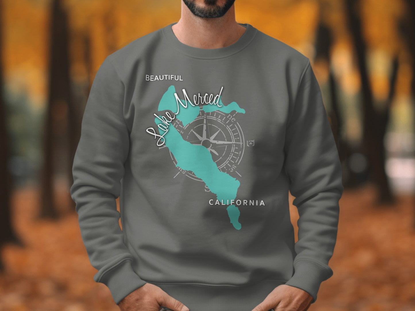Grey sweatshirt with "Beautiful Lake Merced California" map and compass graphic.