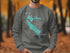 Grey sweatshirt with "Beautiful Lake Merced California" map and compass graphic.