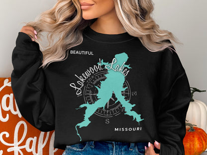 Black sweatshirt featuring a teal map of Missouri with "Beautiful Lakewood Lakes" text.