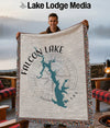 Throw blanket with Falcon Lake map and compass rose design, text "FALCON LAKE TEXAS".