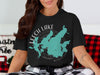 Black t-shirt with Leech Lake, Minnesota map graphic and compass design.