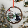 Winter scene ornament with bear, cardinal, and name signs.