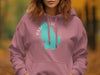 Pink hoodie with teal Ossipee Lakes New Hampshire graphic and compass rose.