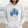 White hoodie with "Little Turtle Lake Minnesota" graphic on front.