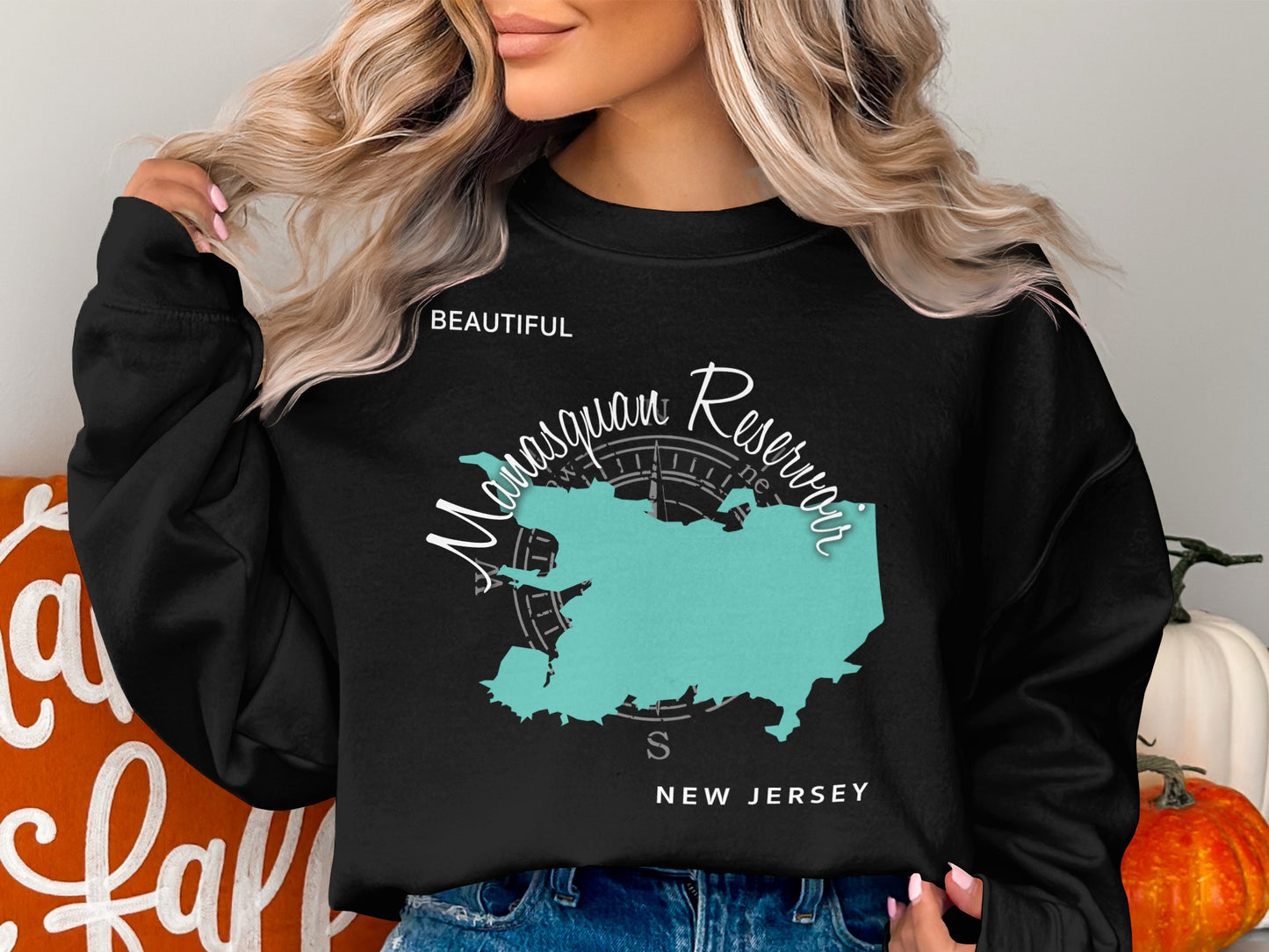 Black sweatshirt with a teal Manasquan Reservoir map and "NEW JERSEY" text.