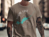 T-shirt with Shoal Lake, Ontario design and compass graphic.