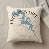 Pillow with blue Evergreen Lake map graphic and compass rose.