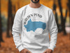 White sweatshirt with Walden Pond Massachusetts map and compass graphic