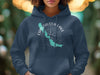 Dark blue hoodie with Chautauqua Lake map and compass design.