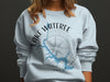 Light blue sweatshirt with Lake Wateree map and compass graphic.
