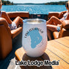 A white insulated wine tumbler with a Lake Istokpoga Florida map graphic sits on a boat table.