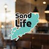 Turquoise map shape with black text "Sand Life" and copyright notice.