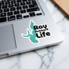 Ray Hubbard Life sticker on a laptop keyboard.