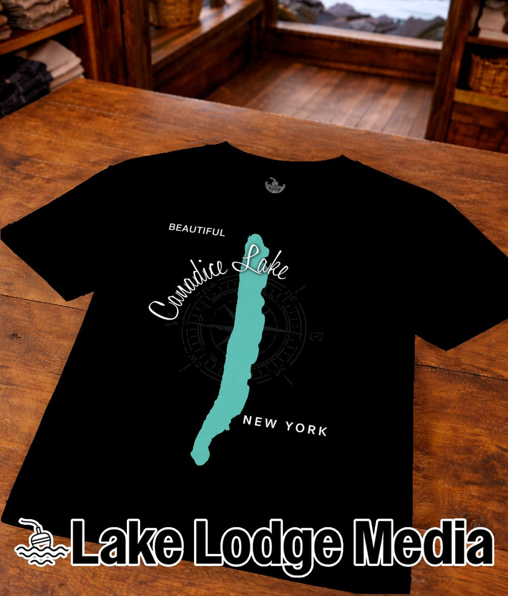 Black t-shirt with "Beautiful Canadic Lake New York" text and turquoise lake silhouette.
