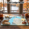 Textured glass cutting board featuring a blue lake map, compass rose, and Grand Lake Colorado text, with snacks.