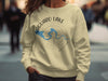 Cream sweatshirt with Saguaro Lake Arizona map and compass graphic.