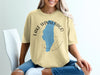 Yellow t-shirt with blue Lake Winnebago map and compass graphic.