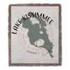 Woven blanket with Lake Kissimmee map graphic and "Florida" text.