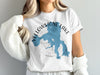 White t-shirt featuring a blue Yellowstone Lake map with compass design and text.