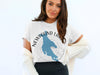 White t-shirt with "Newfound Lake" and New Hampshire map graphic.