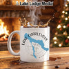 White mug with Lake Charlevoix map and compass design.