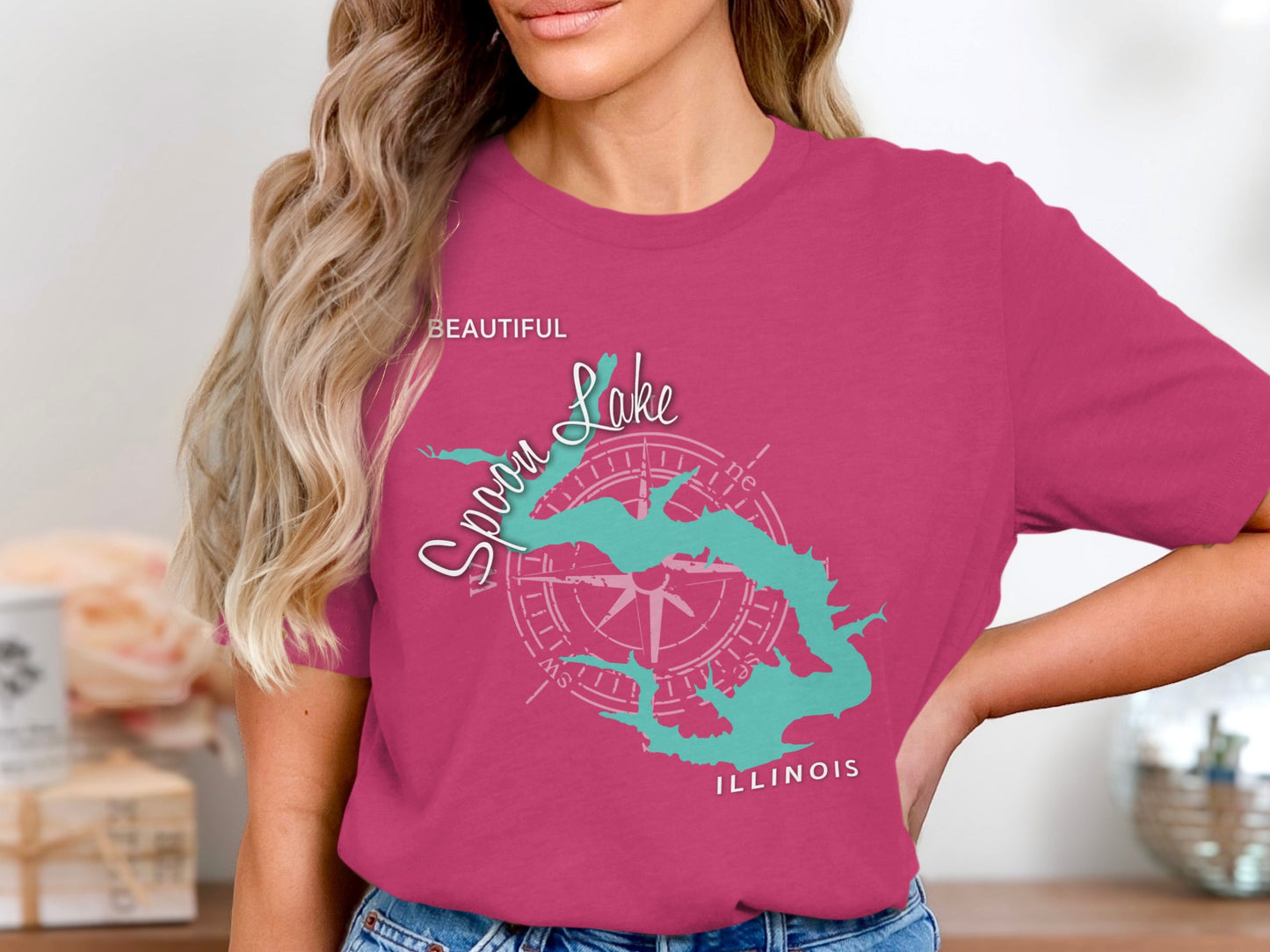 Teal Spoon Lake Illinois map graphic on pink t-shirt.