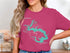 Teal Spoon Lake Illinois map graphic on pink t-shirt.