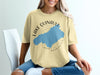 Yellow T-shirt with Lake Quinault Washington map and compass graphic.
