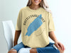 Pale yellow t-shirt with "Rattlesnake Lake Washington" graphic and blue lake outline.