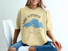Yellow t-shirt with Lake Superior map and compass graphic saying Michigan.