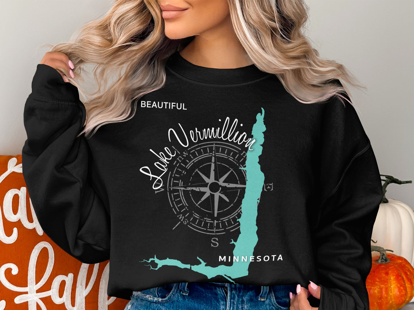 Black sweatshirt with "Beautiful Lake Vermilion Minnesota" and compass graphic.