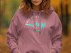 Rose pink hoodie with a compass and Lake Spivey Georgia graphic.