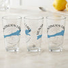 Three clear glasses with Huntington Lake California map and compass design.