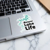 Beaver Lake Life sticker on a laptop keyboard with a marbled background.