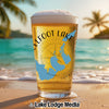Beer glass with "Elfoot Lake" and Tennessee map on a beach background.