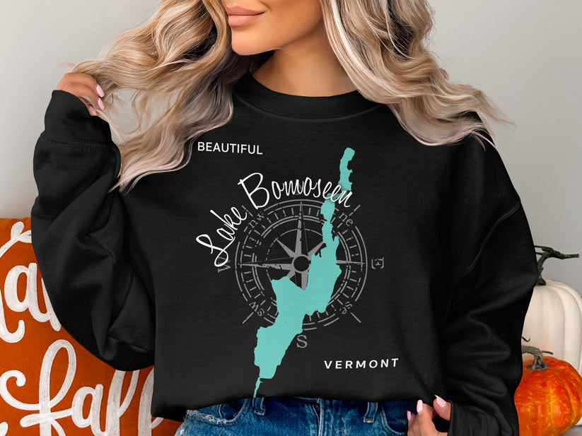 Black sweatshirt with "Beautiful Lake Bomoseen Vermont" and a compass rose graphic.