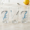 Three clear glasses with Jordan Lake map and compass design.