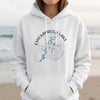 White hoodie with Chickamauga Lake Tennessee compass and map graphic.