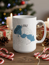 White mug with Forest Lake, Minnesota design and compass rose.