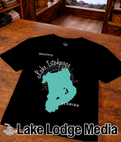 Black t-shirt with turquoise Lake Istokpoga Florida map and "Lake Lodge Media" logo.