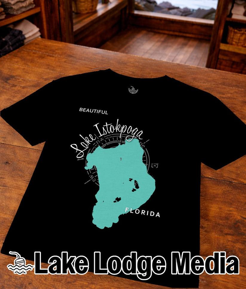Black t-shirt with turquoise Lake Istokpoga Florida map and "Lake Lodge Media" logo.
